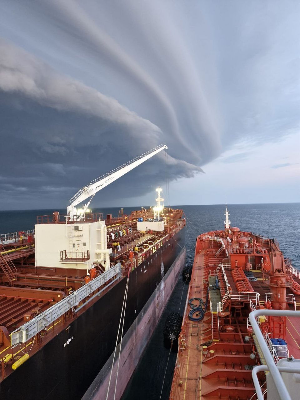 Storm cell approaching during a ship-to-ship operation